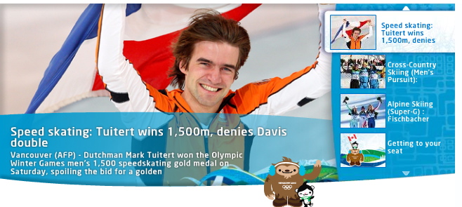 Screenshot: News spinner (four topics on right side, one highlighted; full photo and headline of highlighted story shown at left)